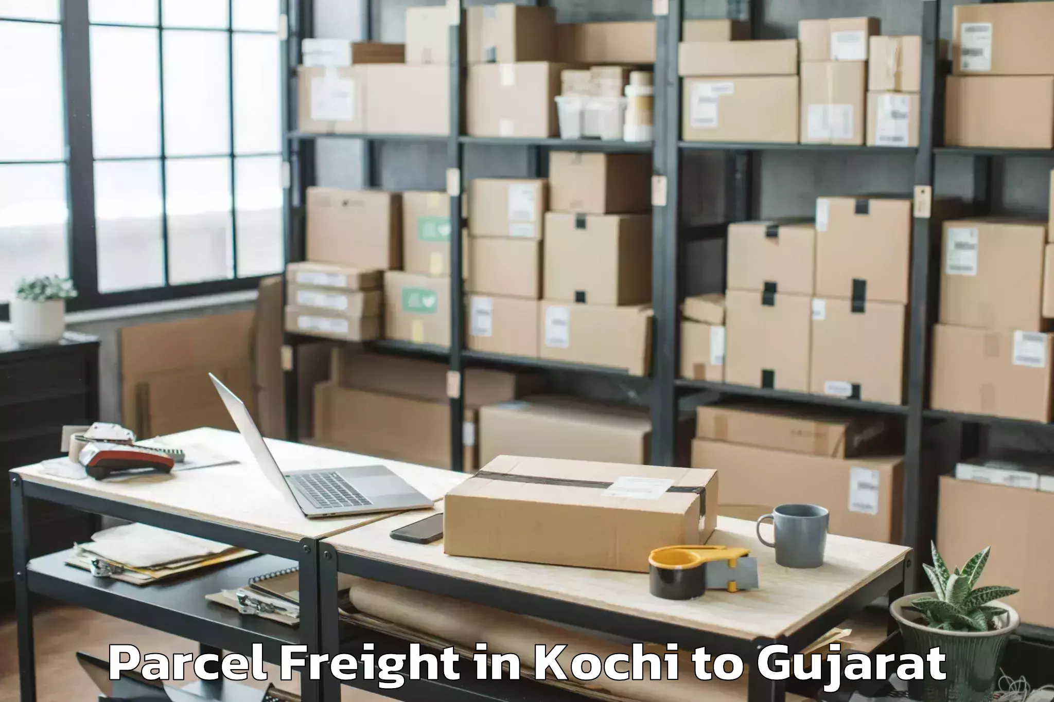 Kochi to Limbdi Parcel Freight Booking